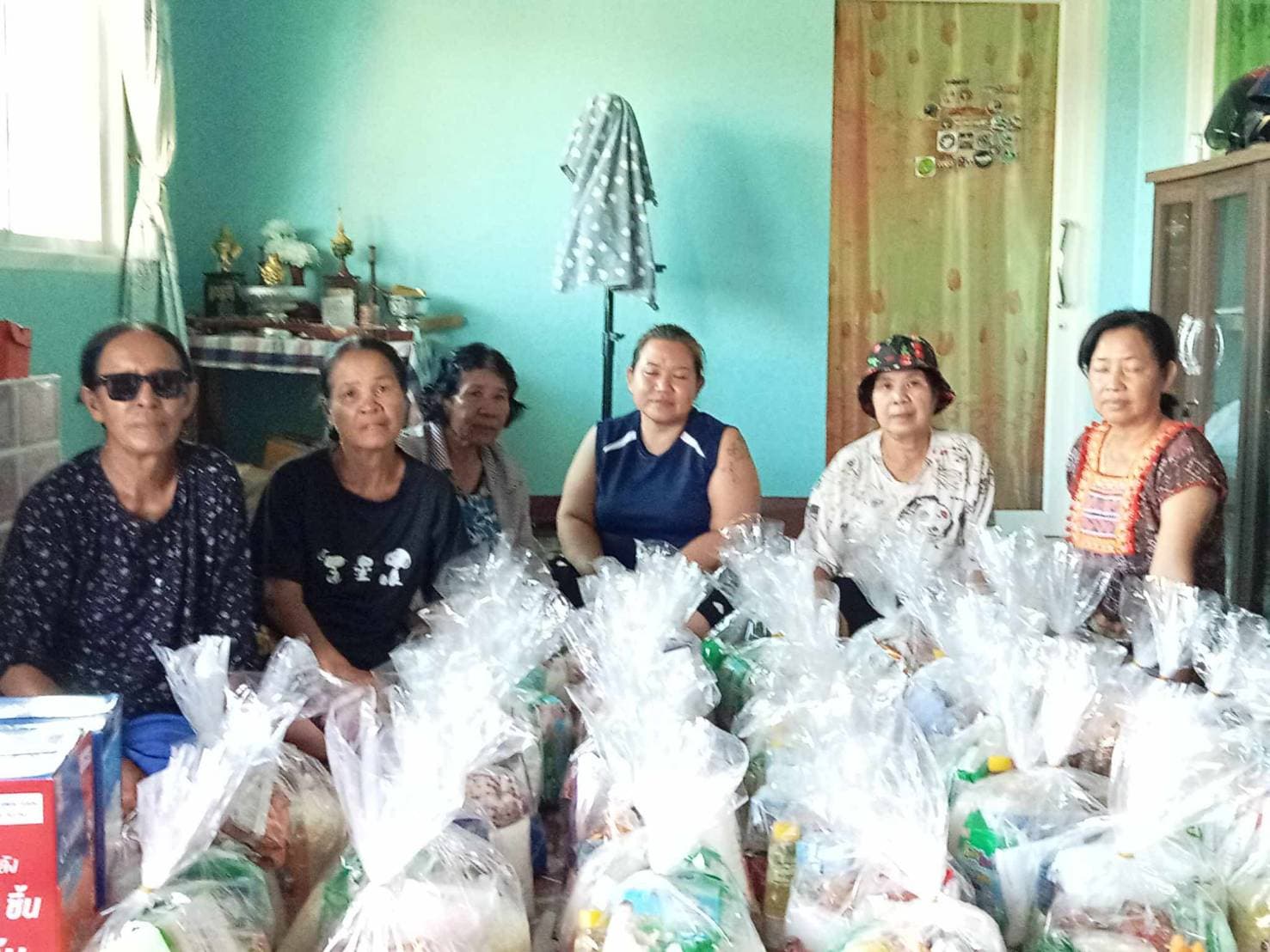 พนักงาน SAM ร่วมใจช่วยเหลือพี่น้องชาวภาคเหนือ สู้ภัยน้ำท่วม — 7/8